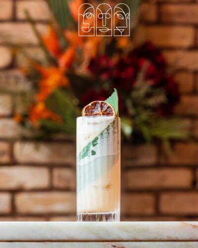 Cocktail against the Townhouse brick wall